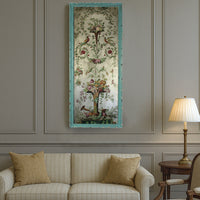 Tall. very ornate glass wall decoration in a vintage tableau, set in a turquoise frame. The most decorative way to enhance your walls, the vertical image on the glass features a classical, ornate floral design echoing the 18th and 19th century neoclassical styles.Swags and swirls of floral decorations with birds to the centre and a large decorative vase to the base full of tall blooms Exceptional vintage look with a colourful, romantic aesthetic.