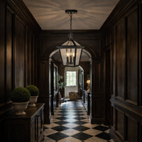 Dark wood-paneled hallway with checkered floor and hanging light fixture