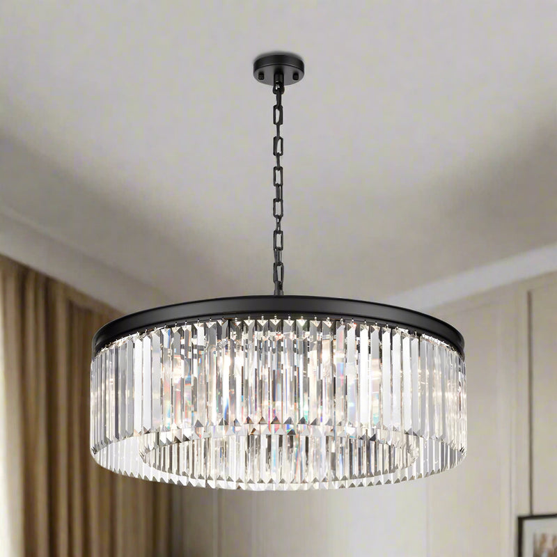 This chandelier brings together a sleek black frame and shimmering prism-cut crystals to create a soft, sparkling glow that instantly warms the room.