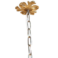 large, aged brass crystal globe chandelier with crystal beading encased in brass metalwork that reflects a pretty pattern around your ceiling and walls. 