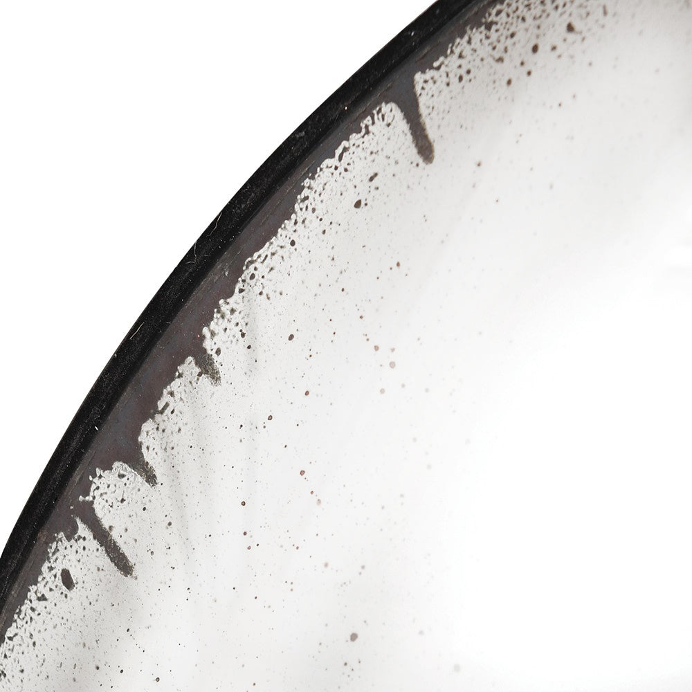 A huge, very distressed black convex mirror, the closest to the original Georgian look.