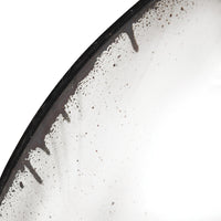 A huge, very distressed black convex mirror, the closest to the original Georgian look.