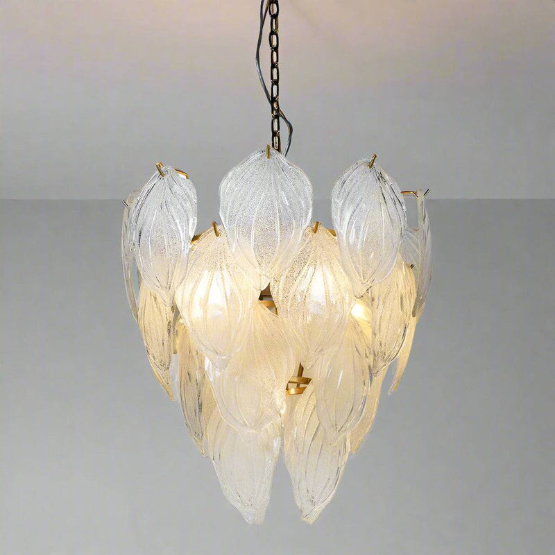 Large crystal chandelier with frosted leaf decoration.