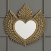 Decorative, large gold heart mirror with winged feather frame. 