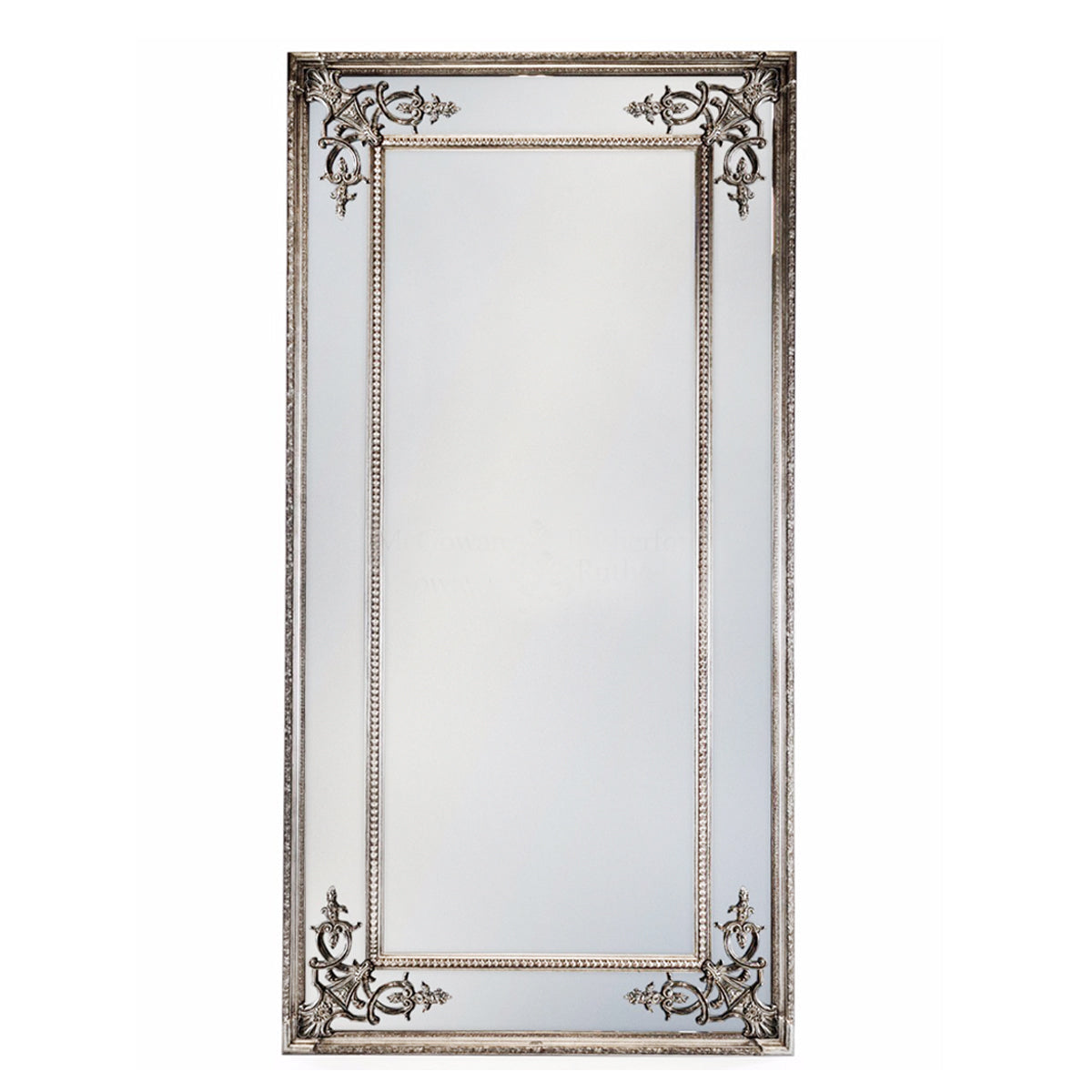 Large ornate silver gilt wall mirror with decorative classical frame, styled as a full-length statement mirror
