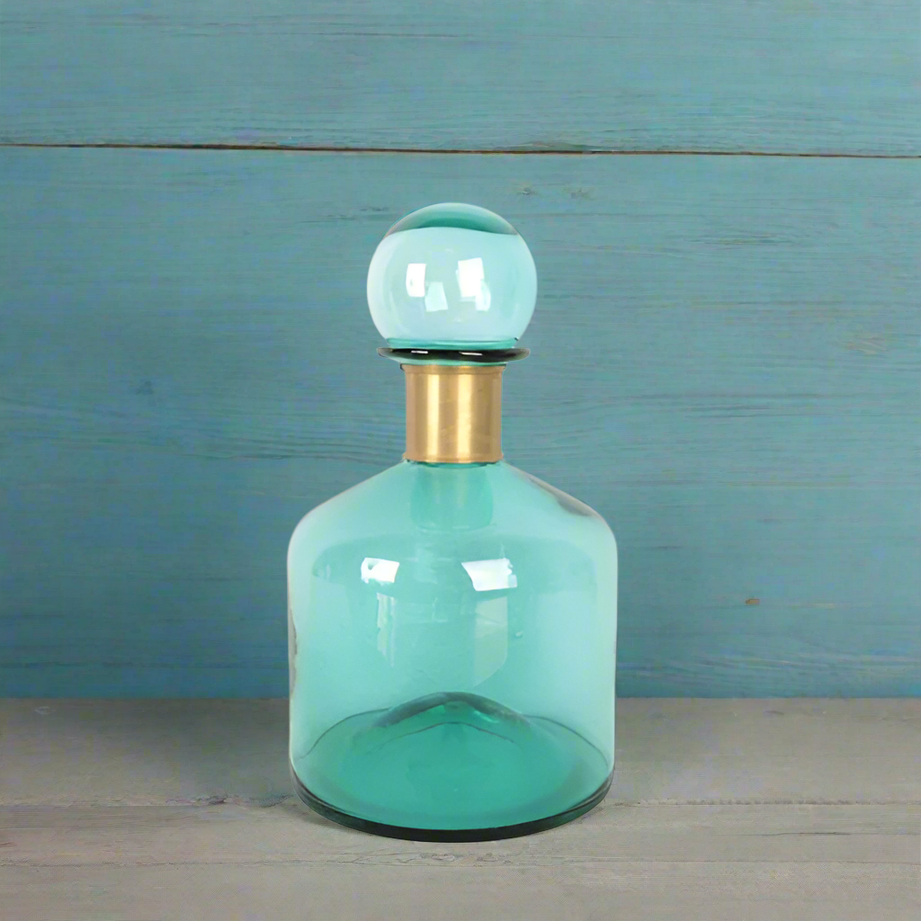Extra large teal coloured bottle with gilt band.&nbsp; A modern home accessory that adds colour and a stylish edge to your interior, either alone or in a group these bottles are an easy option to add a distinct look. 