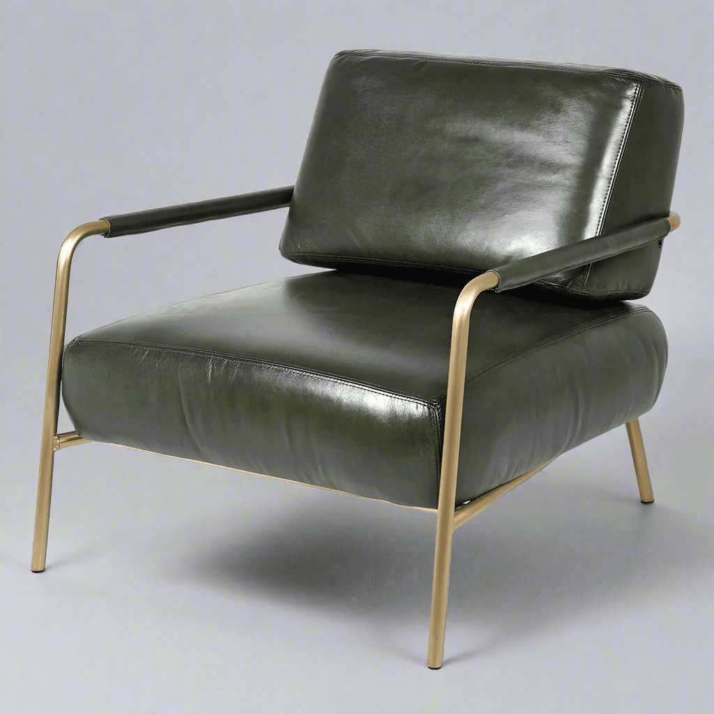 A really stylish sumptuous black leather chair in the mid-century style. The tubular frame of the chair is gilt metal with splayed legs and leather covered arms.&nbsp; This style of chair would fit perfectly into a modern urban setting, it could also sit comfortably amongst classic furniture in a period home.&nbsp; A really comfortable chair with the padded leather seat and backrest but the sleek silhouette is a design classic.