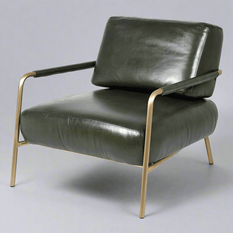 A really stylish sumptuous black leather chair in the mid-century style. The tubular frame of the chair is gilt metal with splayed legs and leather covered arms.&nbsp; This style of chair would fit perfectly into a modern urban setting, it could also sit comfortably amongst classic furniture in a period home.&nbsp; A really comfortable chair with the padded leather seat and backrest but the sleek silhouette is a design classic.
