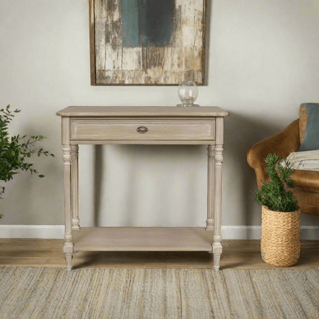 A classic and very pretty console table perfect for a hall or recessed area where extra surface is required. Made from Mindi wood with an ash veneer.
