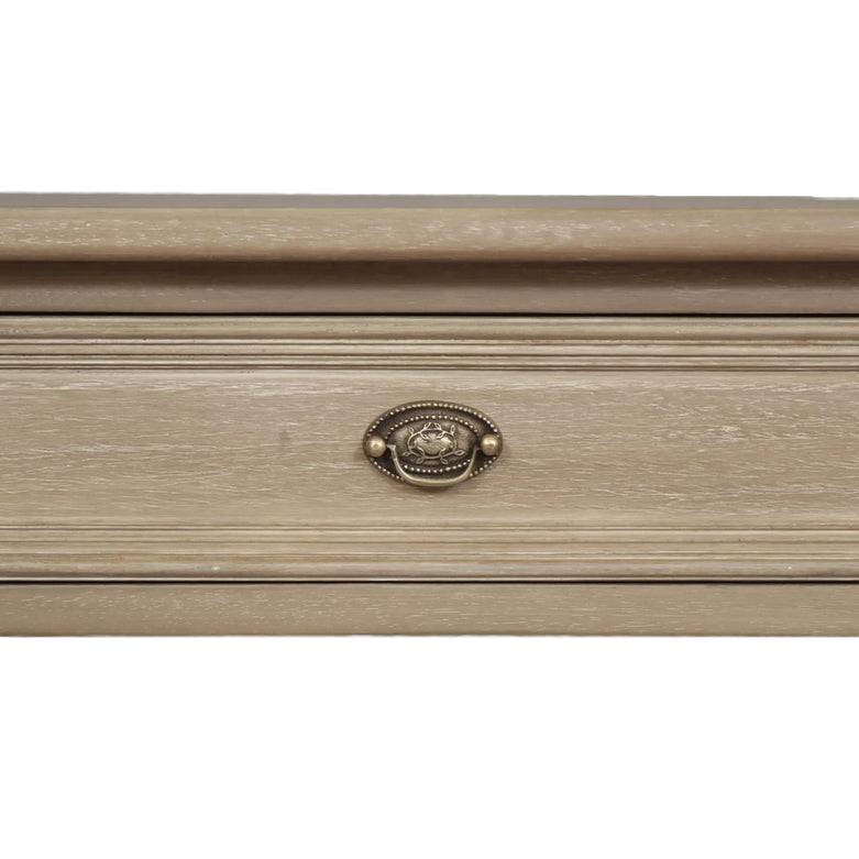 A classic and very pretty console table perfect for a hall or recessed area where extra surface is required. Made from Mindi wood with an ash veneer.