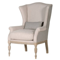 A very pared back, light coloured wing chair sitting on tapered, turned legs.&nbsp; The reverse of the chair is upholstered in a pale striped linen styled fabric with a cushion to the seat in the same stripe.&nbsp; A very neutral chair that would work well in the most minimalist of rooms or as a country house chair.&nbsp; In a living room or bedroom this chair would work beautifully.&nbsp;