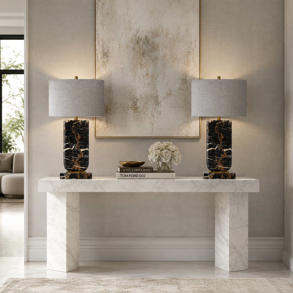 Black veined marble table lamp with grey linen oval shade, gold accents, placed on a white marble console table in a modern interior.