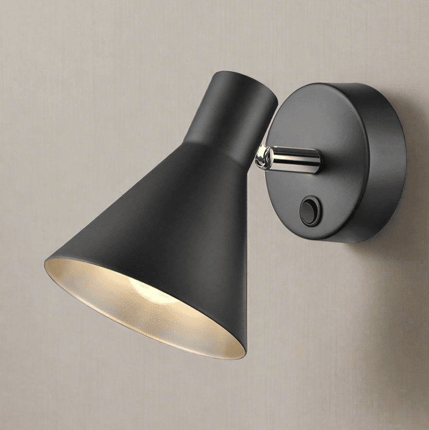 Matt black adjustable wall light with silver inner