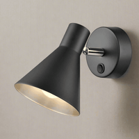 Matt black adjustable wall light with silver inner