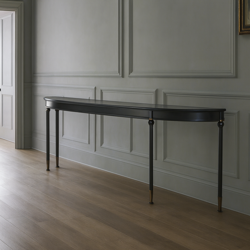 Bring timeless elegance and sophistication into your home with this extra-long black console table &nbsp;&nbsp;designed to transform hallways, entryways, or reception rooms into stunning focal points. With its gracefully curved silhouette, slender tapered legs, and subtle brass accents, this console balances refined style with practical function.
