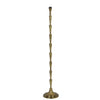 Tall bronze metal floor lamp with a tiered column design and brushed antique finish.