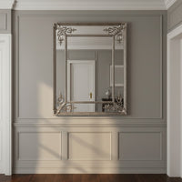 Silver gilt coloured, bevelled glass panels,  French mirror displayed in a classic period hallway.