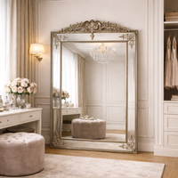 Leaner mirror in glamorous dressing room setting, perfect for luxury bedroom.