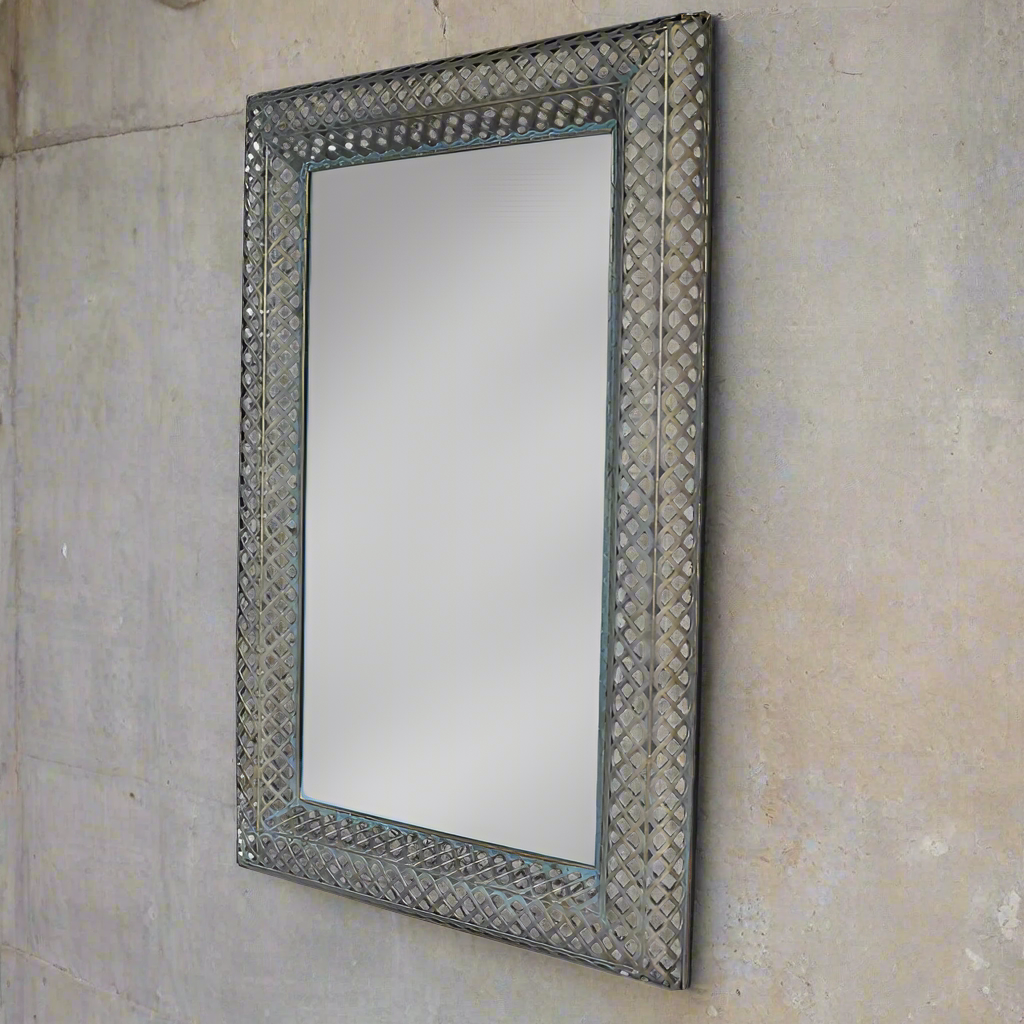 An interesting feature mirror finished in a bronze metal finish interlinked in a lattice style. A great, decorative mirror which will lift any interior and add a Moroccan feel.

