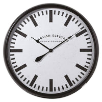 Round wall clock with black frame and white face on a neutral background.