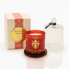 Moroccan Amber luxury scented candle in red glass with gold detailing and a clear cloche, presented in a matching gift box.