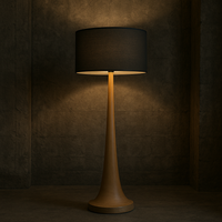 Tall natural wooden floor lamp base with a smooth tapered shape and light wood finish.