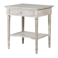 Off white classic one drawer bedside with lower shelf and reeded legs. This is a timeless table crafted individually to the highest quality and the perfect off white, pale grey washed colour that will suit so many interiors. Functional with a drawer and lower curved shelf.