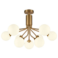 Opaque globe 9 ball chandelier with brushed brass arms and opal glass shades hanging from an adjustable rod