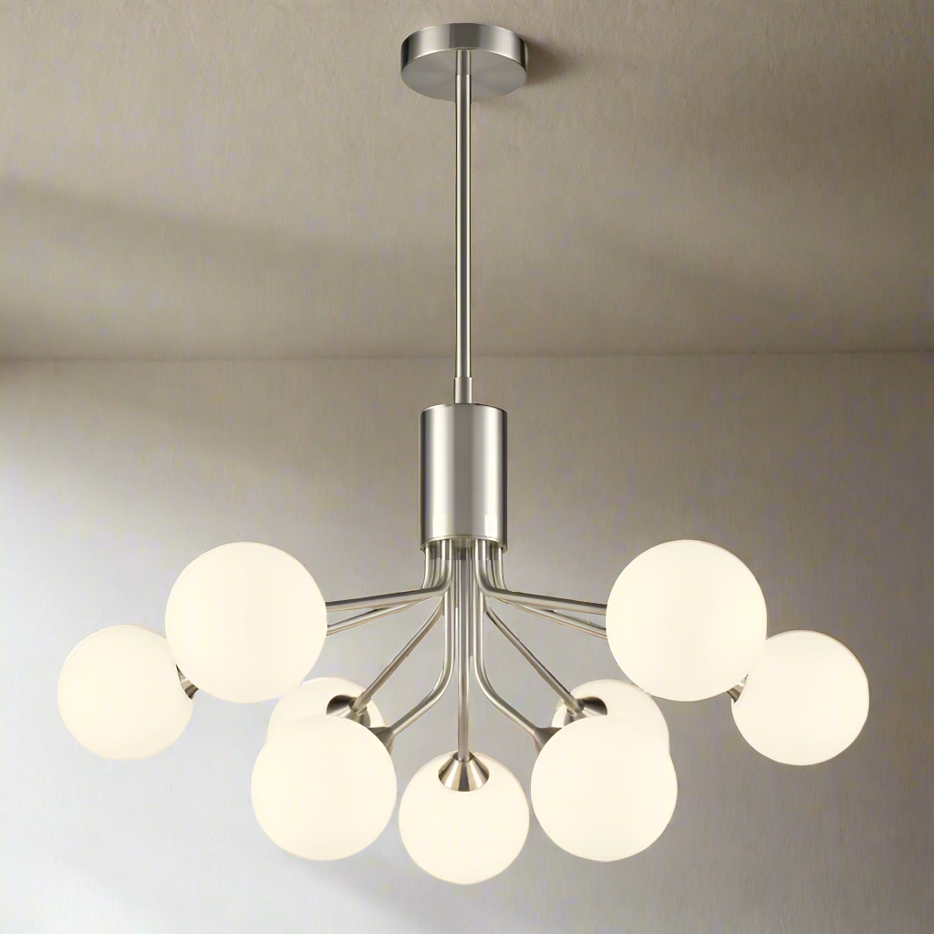 Nine light opaque glass globe ceiling light in satin nickel finish with mid century design