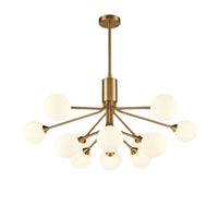 Twelve light opaque glass globe ceiling pendant in brushed brass finish