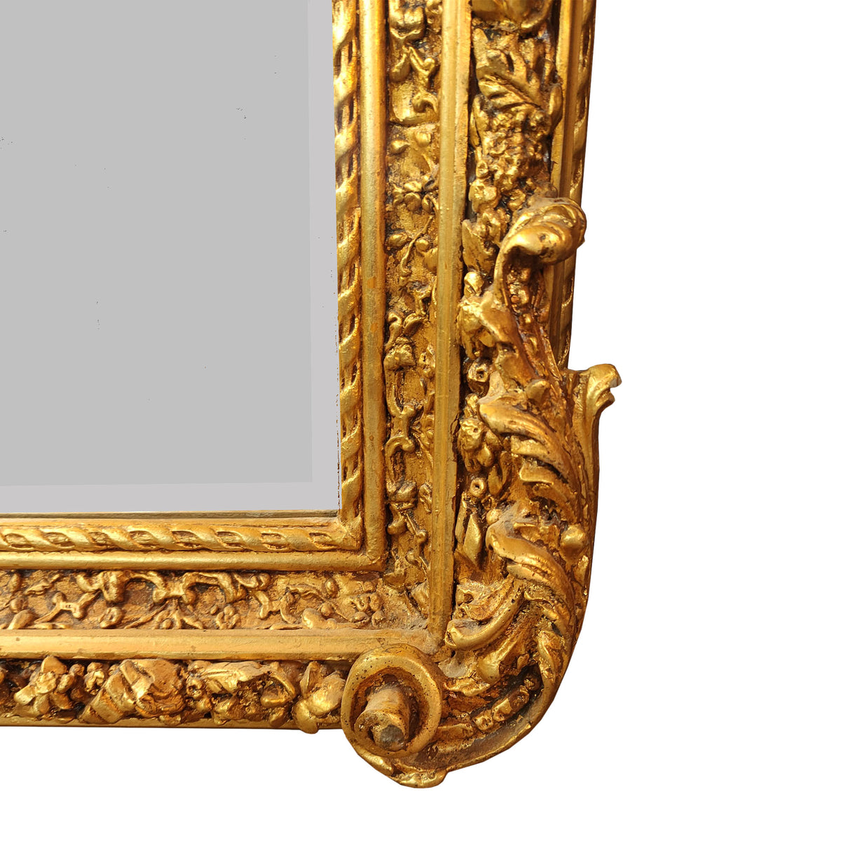Gold ornate mirror frame on a white background - close up of base