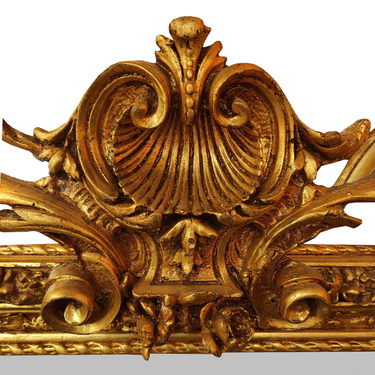 Detail of carving on ornate cherub mirror, plain background