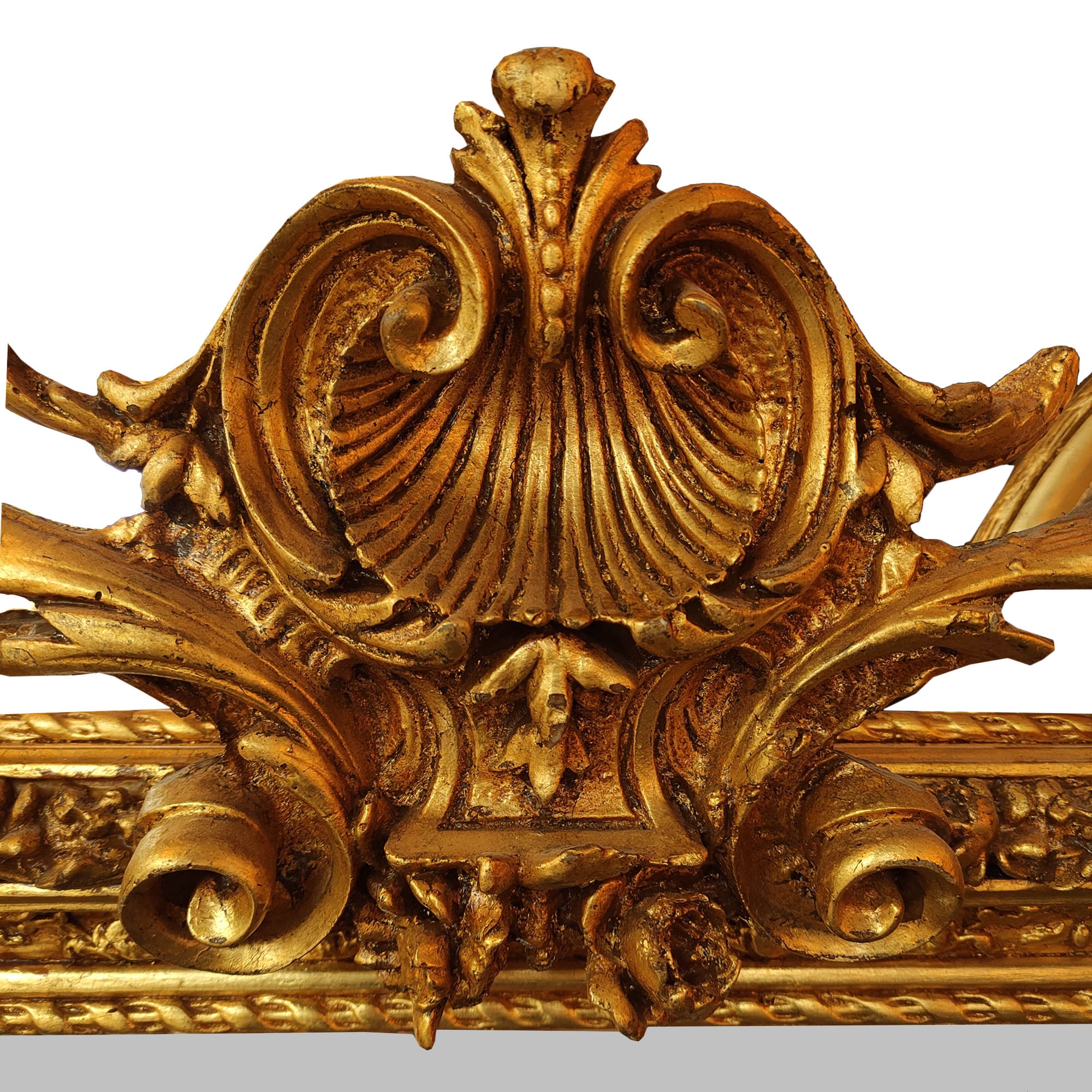 Detail of carving on ornate cherub mirror, plain background