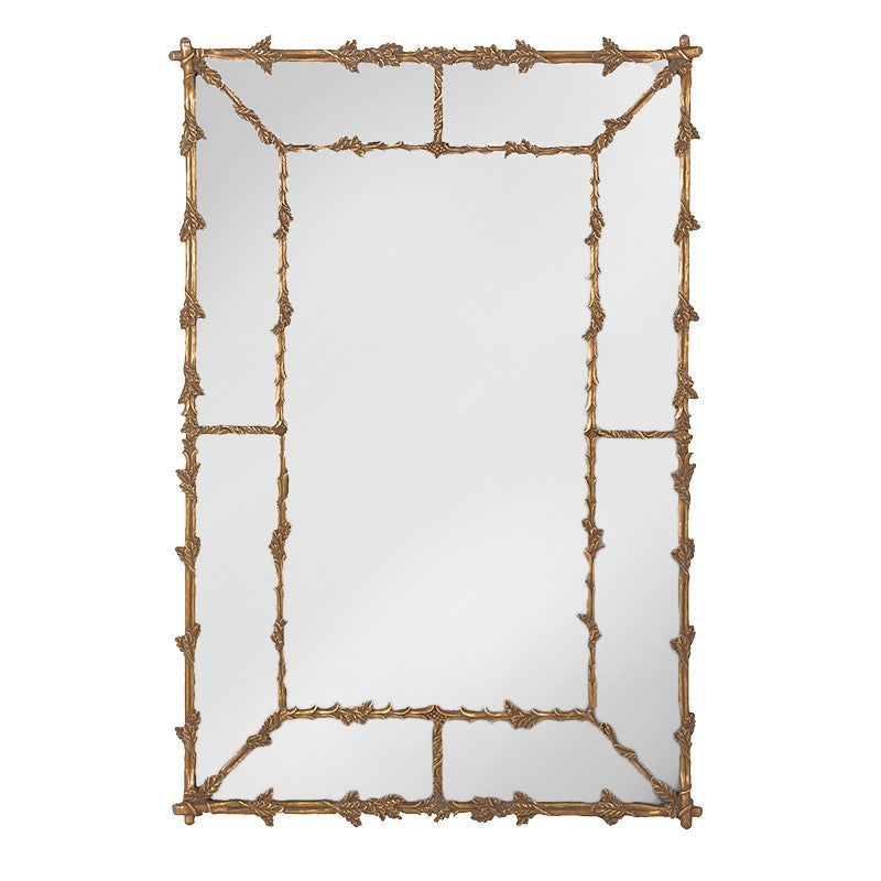 A very large matt gold gilt panel leaf mirror with a rustic verdigris finish. Panelled beveled glass sides reflect so much light in the vicinity of this stunning metal mirror. Add a touch of grandeur to any space - gorgeous. A classic vintage frame of brushed gilt foliage adds a touch of luxury to any space