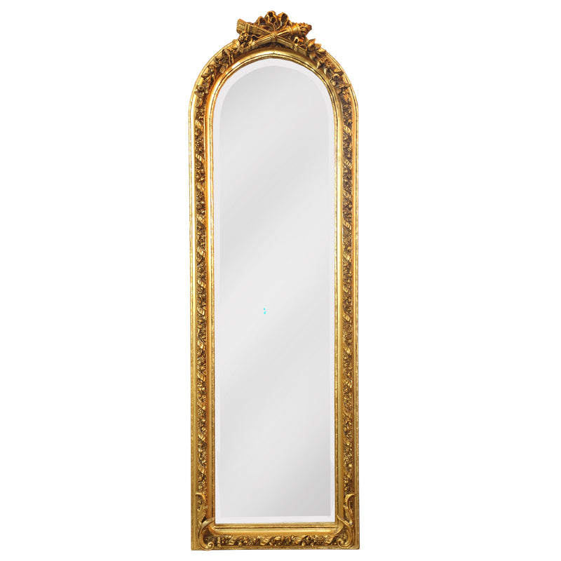Tall ornate gilt mirror perfect for dressing room or bedroom.