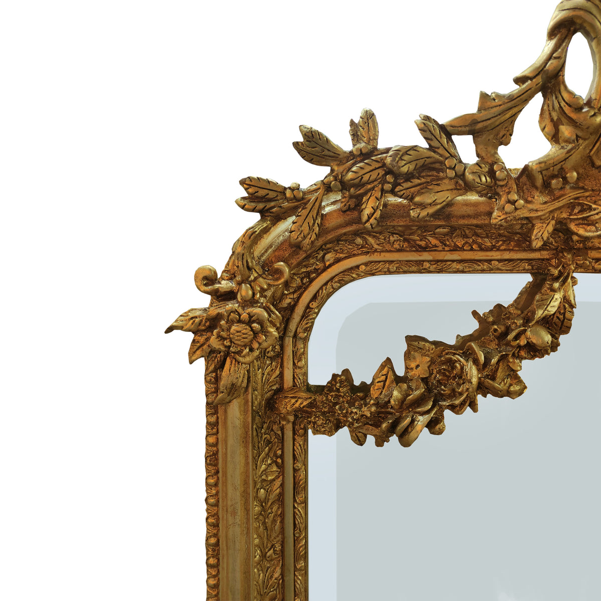 An elaborate mirror, framed with swags, garlands, on a white background.