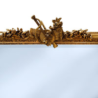 Ornate rectangular gold overmantle mirror with carved floral crest and gilt frame. Close Up of Crest.