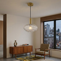 In a mid-century style situ, with abstract carpet and simple furniture.