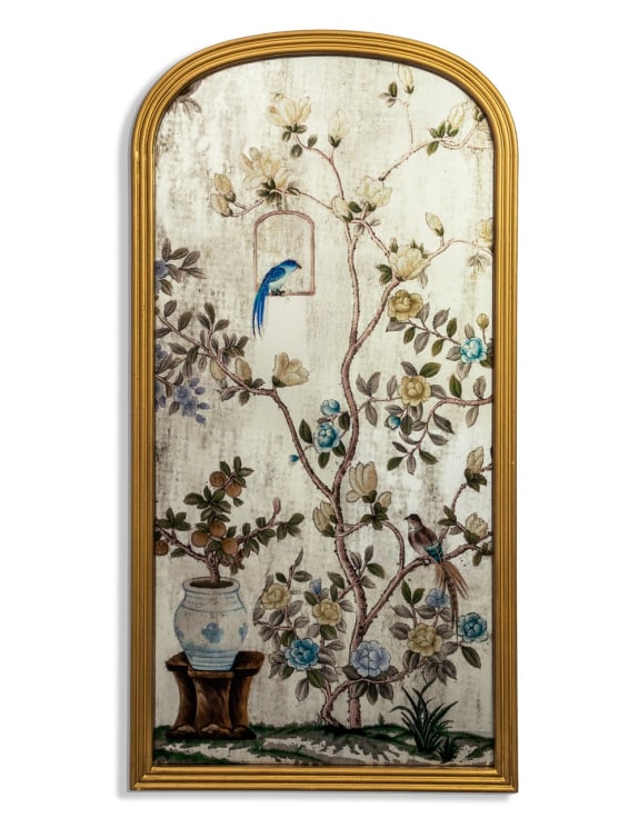 Ornate, painted wall mirror, birds and foliage on a neutral background.