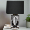 This beautifully black and white pattern ceramic lamp with black panthers would suit a cool contemporary interior.&nbsp; These lamps come with a large black fabric shade to complete this sophisticated look.