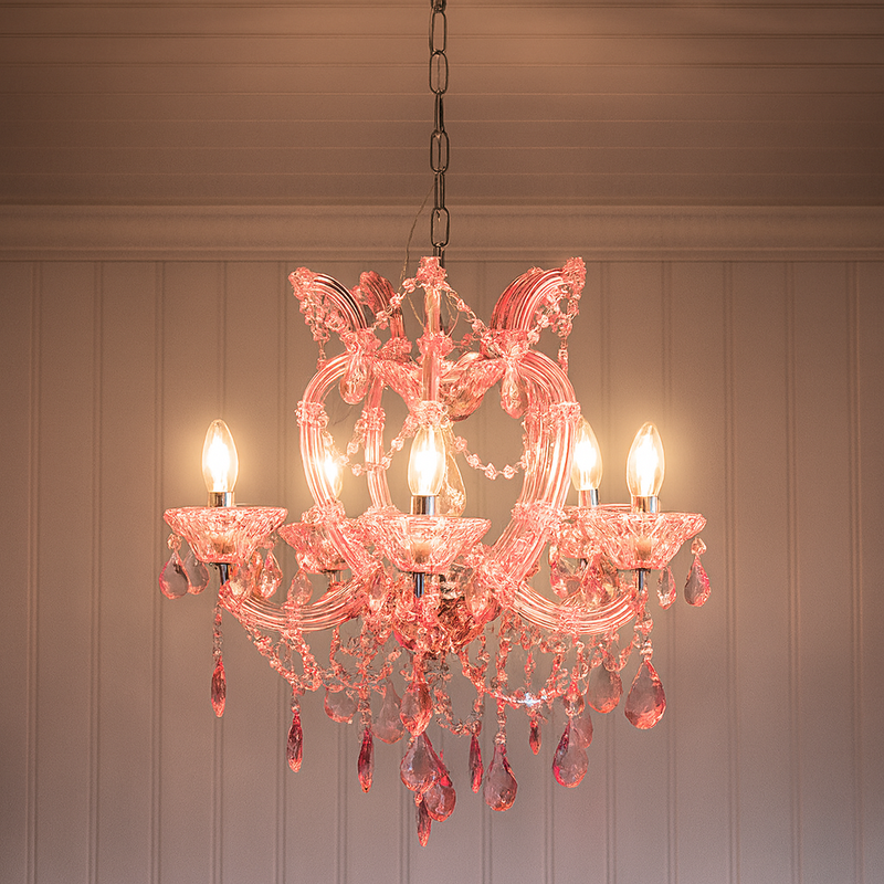A pink crystal chandelier with five arms, a perfect chandelier for a dressing room or girl's bedroom.&nbsp; Pretty and useful, the five candle bulbs spreading light throughout the room. Coloured crystal chandeliers are a great way of bringing both colour and light to a room. They are very atmospheric and add a vintage aesthetic.