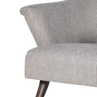Discover the Striped Armchair, comfortable with pinstripe fabric, perfect for any setting, from country to town house, with tapered wooden legs.