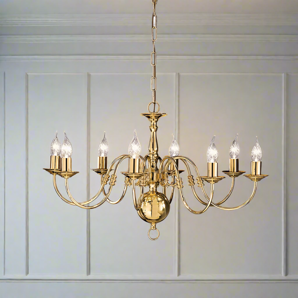 A polished brass eight-arm chandelier with a classic design, hanging against a neutral background.