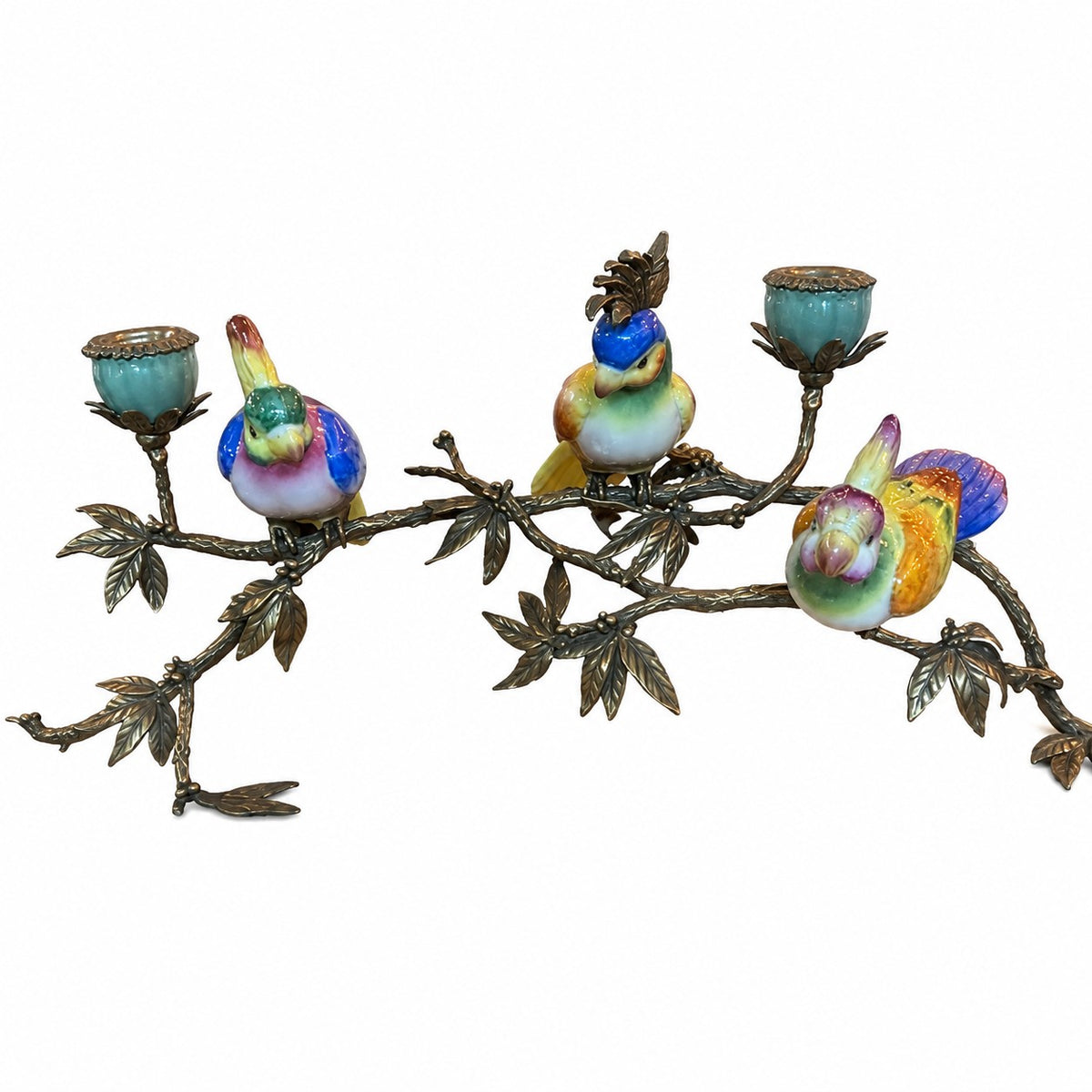Decorative candleholder with three colourful porcelain birds, a bronze-style leafy branch and two porcelain candle cups.