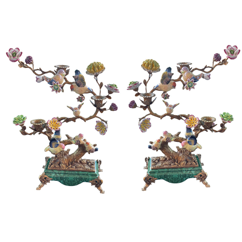Bronze sculptured branches in this candelabra hold little porcelain birds and flowers and on the branches there are three bronze candleholders.&nbsp; A mixture of greens, pinks, yellow and blue, the colourful tree is set on a rectangular green porcelain base on small bronze feet. The most decorative candleholder would look stunning as a centrepiece or set on a beautiful piece of furniture to add interest and a luxurious touch to your interior. 