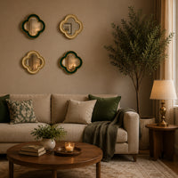 Small quatrefoil mirror with a luxurious gold beaded border in a gallery wall