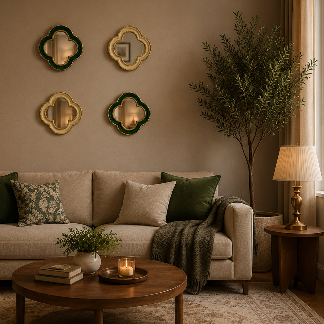 Small quatrefoil mirror with a luxurious gold beaded border in a gallery wall