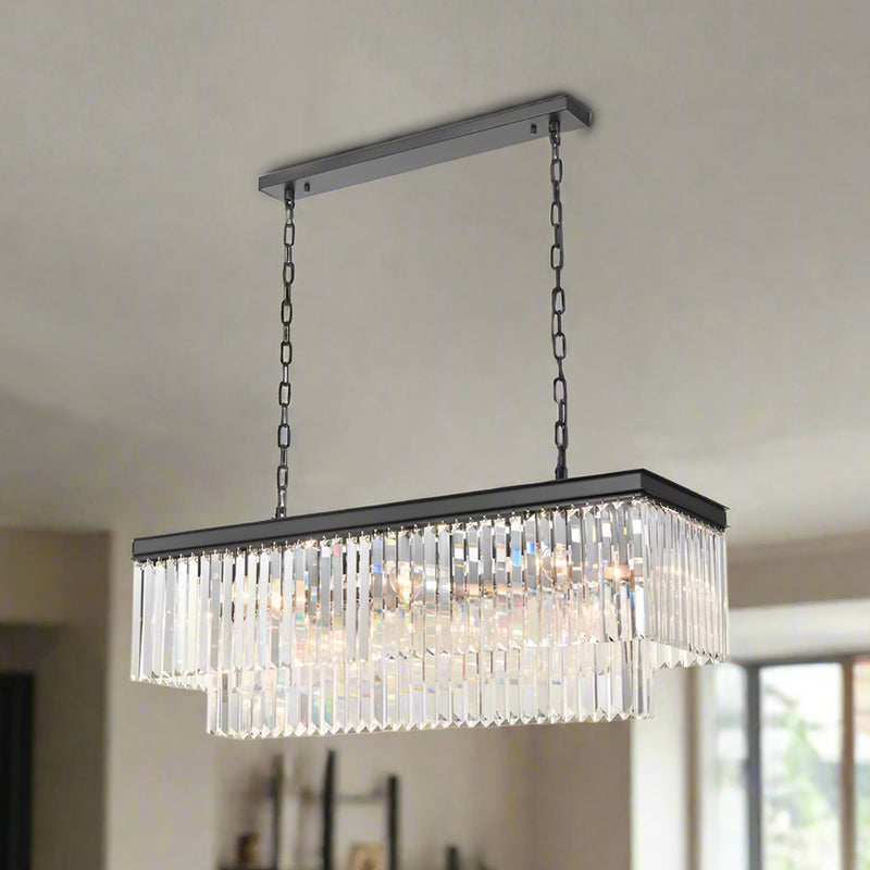 Rectangular chandelier with a black frame and rows of prism-cut crystal drops, suspended from dual black chains.