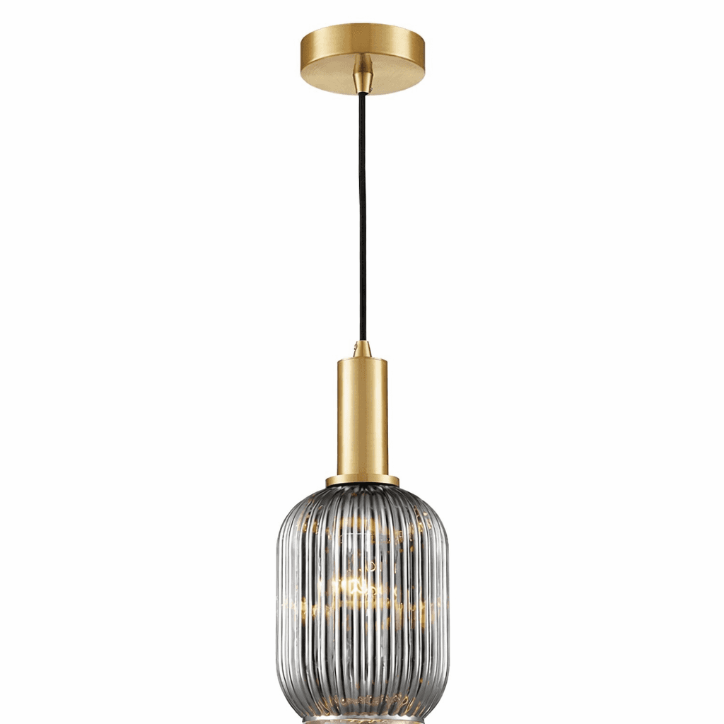 Smoked glass, ribbed pendant with gilt metal fitting on a simple, plain white background. 