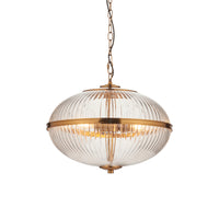 This elegant globe pendant light features a ribbed glass shade with a warm brass finish, blending vintage charm with modern appeal. Ideal for dining rooms, entryways, or kitchens, it provides soft, ambient lighting with timeless style. Compatible with LED bulbs and adjustable chain height for versatile installation.